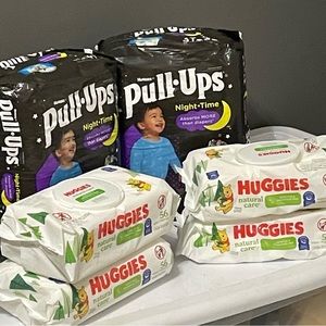 Two pull ups 3t-4t and four Huggies wipes.